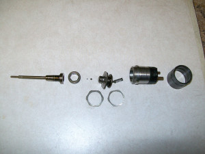 72i17. Disassembled top half of HPCR injector.