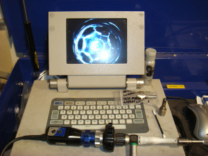 72i8. Borescope on-screen view of the inside of an extrude honed 12-valve injector nozzle.