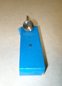 72i19. Fuel return seat, check ball, and end of armature.