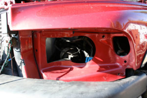 Canadian Ram truck needs sheetmetal cut for Sport headlights.