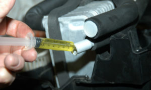 A/C oil added to system.